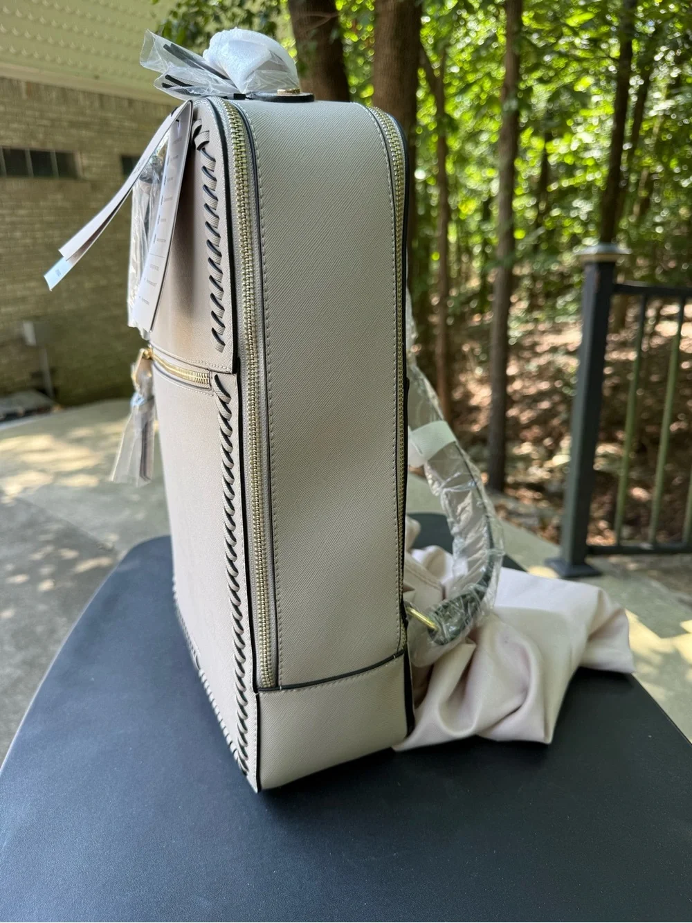 Calpak Cream Leather Backpack with Whipstitch Trim and Gold Hardware